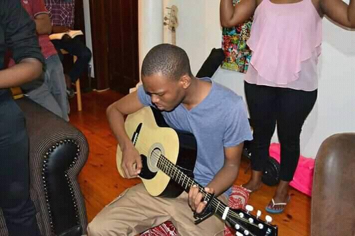 Young Kutlo leading worship